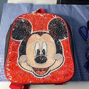 Brand-new beautiful Mickey backpack changeable from Mickey Mouse to Minnie mouse